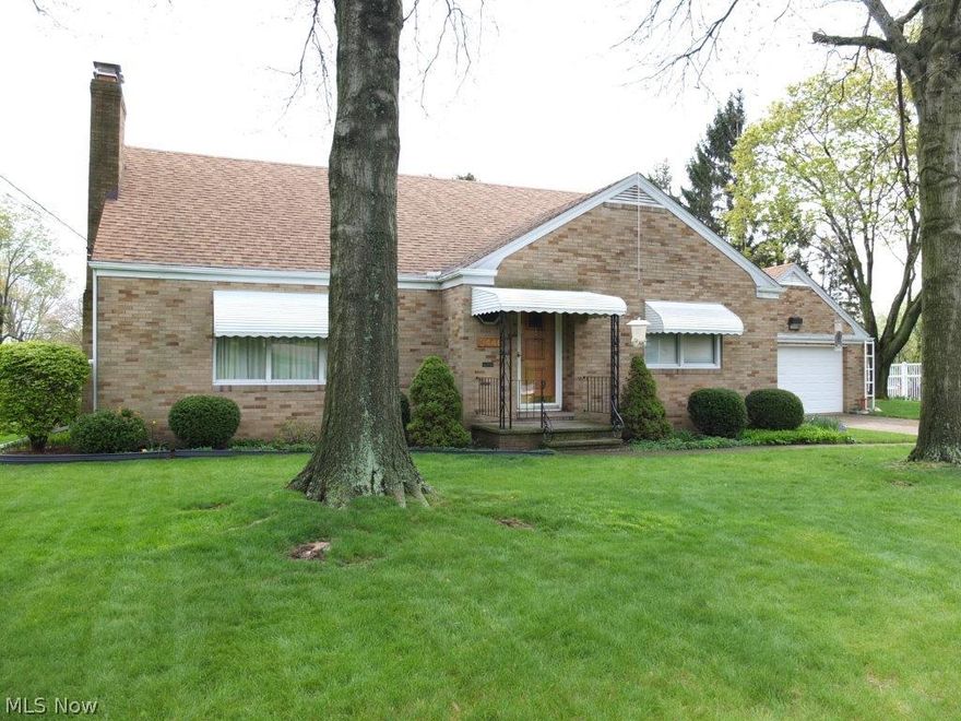 Over 2,500 square foot home on corner lot! Updated kitchen with pantry, built in desk, tile backsplash, new countertops, new countertop range and new stainless steel refrigerator, wall oven and dishwasher. Large 20x16 living room with wood burning fireplace. Formal dining room and a dinette off the kitchen. 1st floor office or den too! Large master bedroom on the main floor. 2 huge (17x15) bedrooms on the 2nd floor. Updated full bath on the main floor with new countertop, new sink and tile floor. Remodeled half bath on the 2nd floor with pedestal sink, tile floor, 2 closets and updated fixtures. Hardwood floors in the living room and bedrooms 2 and 3. Tons of built in storage spaces including a cedar closet! Full basement provides even more storage space. 2 car garage with paved driveway and turn around. Beautifully landscaped corner lot with mature trees and perennial gardens. A must see!