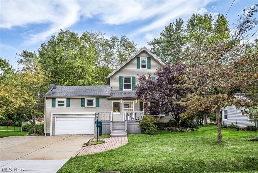 We can't wait for you to see this updated colonial! Sitting on a beautiful, well-manicured street in Stow on nearly half an acre, it is centrally located between Hudson, Munroe Falls, Cuyahoga Falls & Kent, so your weekend explorations are endless! Inside the home, you'll find 3 bedrooms plus 2 flexible rooms, 1 1/2 bathrooms and almost 2000 sq ft of finished living space. The possibilities are limited only by your imagination. Whether you enter through the front, or the garage, you will find a "mudroom" entry for each location. HUGE WIN, w/ winter activities just around the corner. From the garage, you can head to the sprawling back deck that looks out to the level, park-like backyard, or into the large kitchen which shares it's space w/ a sunny breakfast nook, & 1/2 bath. Rounding out the main level is a formal dining & family room and a 300 sq ft bonus room to use how you wish! On the 2nd level, you'll find 3 good-sized bedrooms & full bathroom. On level 3, a 375 sq ft finished atti