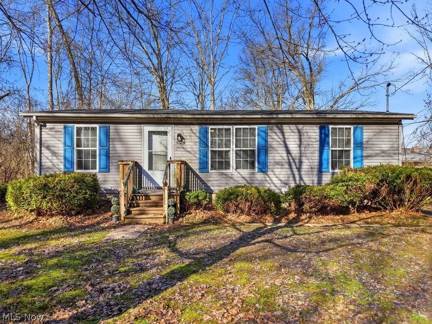 Welcome to this adorable ranch in Ravenna! Situated on 4 parcels totaling just over half an acre lot, this property offers space and flexibility. Step inside to an open floor plan, where the spacious living room flows seamlessly into the eat-in kitchen, perfect for everyday living and entertaining. The home features 3 bedrooms and 2 full bathrooms, plus a detached 2-car garage for extra storage and convenience. Call today to schedule your showing and see this home in person!