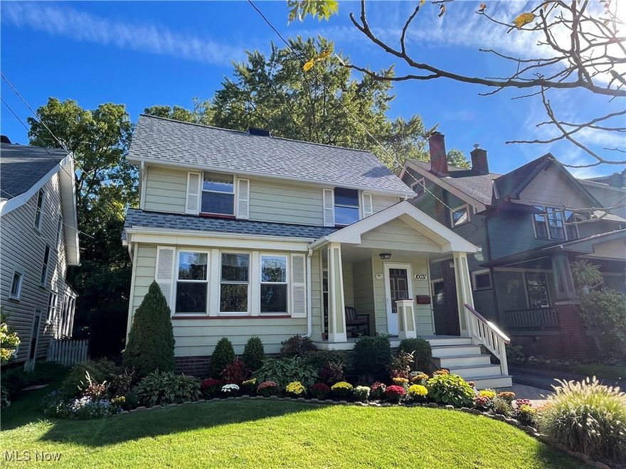 Here is your opportunity to live within steps of Edgewater Park.  Move right into this beautiful 3 bedroom Colonial with amazing covered stone patio, fenced yard and oversized 2-car garage.  Updates include 2024 furnace, hot water tank, range, dishwasher and roof is under 5 years old.  Features included hardwood floors, natural woodwork, fireplace, bedroom level laundry, nice closets, beamed dining room ceiling and leaded glass windows.  Kitchen with large single bowl stainless sink, ample counter space and all appliances is open to the dining room and has sliding glass door access to the large covered back patio (14 x13).  Large fenced yard is perfect for the dog lover and the gardener with its beautiful perennial gardens and raised garden bed waiting for your spring planting. Huge two car garage with electric opener has plenty of room for storage.  Great location walkable to Edgewater Park and Clifton shopping district.  Bike to Gordon Square, Ohio City and Whiskey Island via the Lakefront Bikeway. RTA Redline train to airport, downtown and University Circle is right around the corner.  Easy access to Lakefront Shoreway and I-90 for travel by automobile.  Don't let this one slip away.