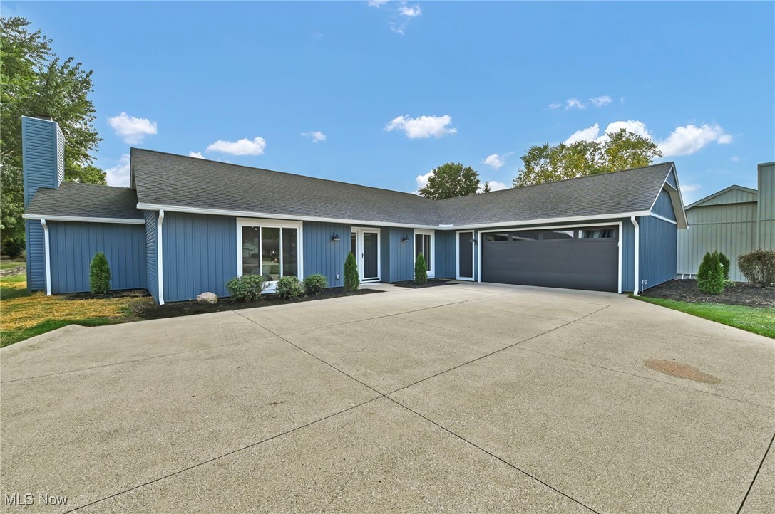Welcome to this fully remodeled Bob Schmidt home tucked away on a quiet cul-de-sac in Strongsville’s highly sought-after Meadowood community. Step inside to find an abundance of natural light streaming through brand-new windows. The inviting living room boasts vaulted ceilings, a wood-burning fireplace, and stunning floor-to-ceiling windows overlooking the serene backyard.
The kitchen is a true centerpiece, designed for both function and entertaining with all new stainless steel appliances, quartz countertops, soft-close custom cabinetry, and a three-pane slider opening to a brand-new stamped patio with a paver seating wall, perfect for outdoor gatherings. A versatile flex space at the front of the home provides endless options, whether as a home office, playroom, or even a 5th bedroom. In addition, you’ll discover four spacious bedrooms and two full bathrooms, including a generously sized primary suite featuring its own private slider to the backyard, a walk-in closet, and a beautifully updated en suite bath.
Enjoy Meadowood’s various community amenities, including an Olympic-sized pool, tennis courts, and a spacious clubhouse perfect for social gatherings or private events. Recent updates include a new roof, siding, windows, flooring, and garage door. The HVAC system was replaced in 2022, offering peace of mind for years to come. This move-in ready home combines modern updates and exceptional style with timeless comfort in a desirable neighborhood known for its community amenities and convenient location. This is a must see! Schedule your private showing today!
List agent shares ownership interest.