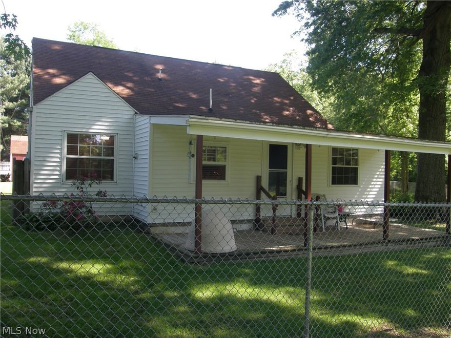 Lot 112 x 410, half fenced, park like setting. 24 x 28 garage, 8 x 12 workshop, 16 x 12 storage building. replacement window. All utilities