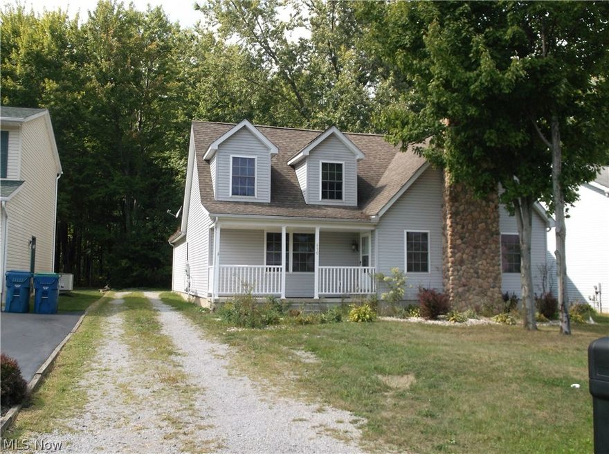 This Home is only 13 years young, Features Large Livingroom  with Stone Fireplace, Large Master suite on  1 st floor with huge Master bath and Garden Tub, Other 2 bedrooms up are very big also with full Bath. Large Eat-in- kitchen, 1/2 bath off Kitchen with 1 st floor laundry attached Garage with Back entrée man door go's right into Mudroom"" Sunroom is off Kitchen. Really nice front covered porch. 4 th Bedroom is in Basement carpeted with walk-in Closet""This one is a must seeeeeeeeeeeee""" New Photo's coming soon""" Week of 09/01/2015