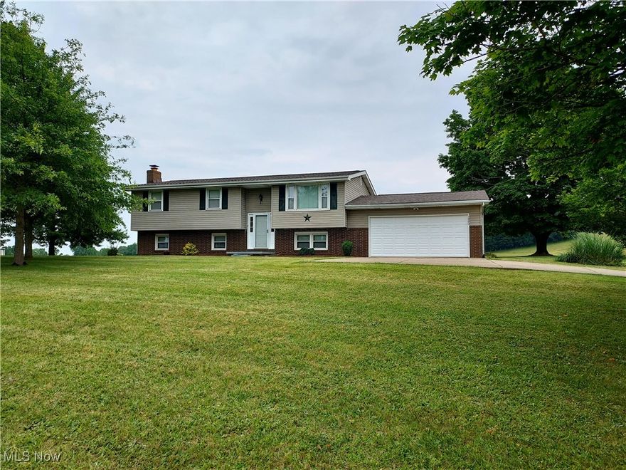 Nice 4-bedroom home on almost 2 acres in the country. This home features amazing views of a small lake in front of the home and farmland/woods to the rear of the property. Home has 3 bedrooms on the upper level with 2 and half baths. The basement has an additional 4th bedroom. The lower level also has a large rec room with a fireplace and wet bar that can be finished to your liking.