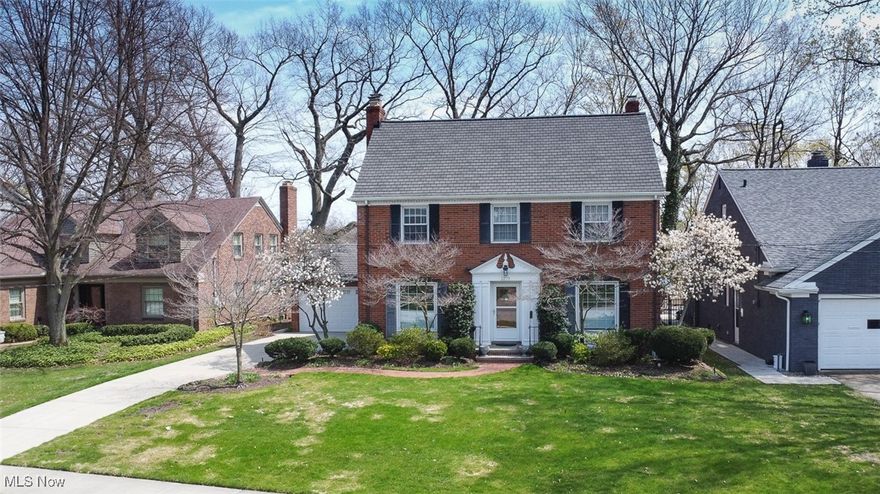 Classic Brick 5 BR Center Hall Colonial on the Valley! Gorgeous views from atop the Metroparks with scenic views year round! Beautiful Hardwood floors throughout! Family room addition features tile floor, half bath and a large viewing window! Spacious rooms! Eat-in Kitchen, formal Dining room, Living room with gas fireplace. Master suite with half bath, 2nd floor 4 square with full bath, finished bedroom on 3rd floor with full bath. Huge finished rec room with bar and fireplace. Cherished for 65 years by owner. A wonderful opportunity to renovate and enjoy the beautiful setting and location.