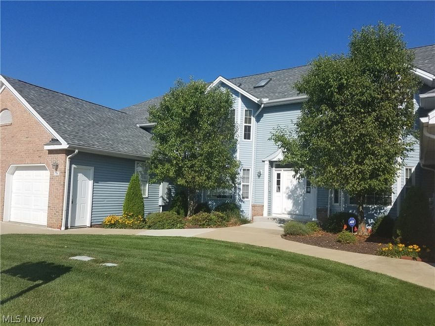 Welcome to this move-in ready condominium!!   Completely updated only 5 years ago, this 2 bedroom, 2 full bathroom home features convenient first-floor living with an inviting, open living area.  There are updated hardwood/laminate floors throughout the home, updated bathrooms with granite countertops, ceramic tile flooring, and newer shower/bathtub surrounds.  Stainless steel appliances, including built-in microwave, in the open kitchen with plenty of cupboard space and ceramic tile flooring.  Updated first-floor laundry room includes washer and dryer and new laminate flooring.  Full basement with recreation room on one side.  Complete with your own private outdoor seating area and attached 1-car garage, enjoy condominium living at its best!