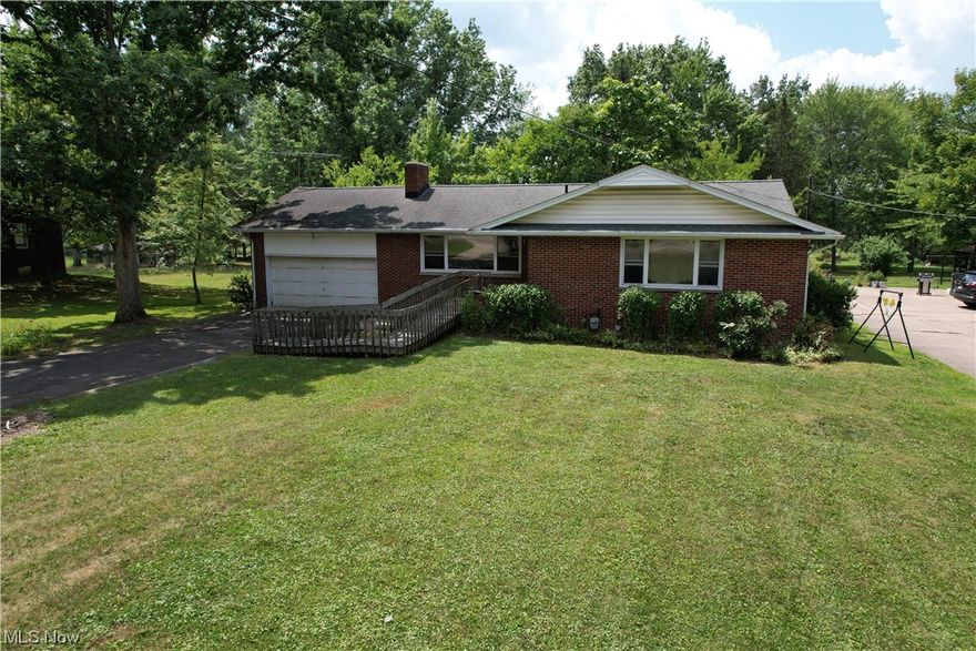 Move right in to this 3 bedroom brick ranch home in the center of Austintown that features a beautiful 1-1/4 acre lot with mature trees. Freshly painted and ready to go. There is a fireplace in the living room when you walk in the front door. A large bedroom master suite with full bath and two additional bedrooms and another full bath. The open kitchen and dining area round it out. The full basement can be finished to your desire that has another fireplace, 1/2 bath and laundry area. Out back there is a nice out building for your equipment.