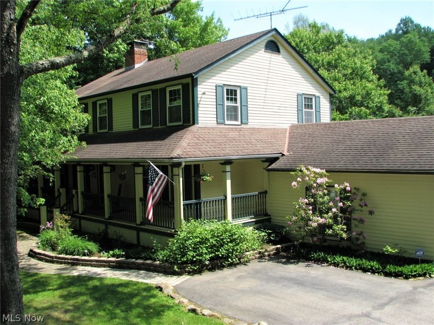 Breathtaking Colonial situated on 4.5 heavily wooded acres! Relax next to your own private spring fed pond with fountain and bridge to back acreage!! Enjoy coffee on the covered front porch swing!! Chefs dream kitchen features massive island, maple cabinets, granite counters, fireplace and all appliances!! Master suite with full bath!! Awesome family room with vaulted ceilings and full wall fireplace leads to freshly stained deck!! 24 x 24 barn with water and electricity.  First floor laundry room and office/5th bedroom!! Partially finished basement featuring two rec rooms!! There is also a workout area, storeroom and dream wood shop!!  All neutral colors and meticulously clean from top to bottom!!  Just move in and relax with nothing to do for years to come!!