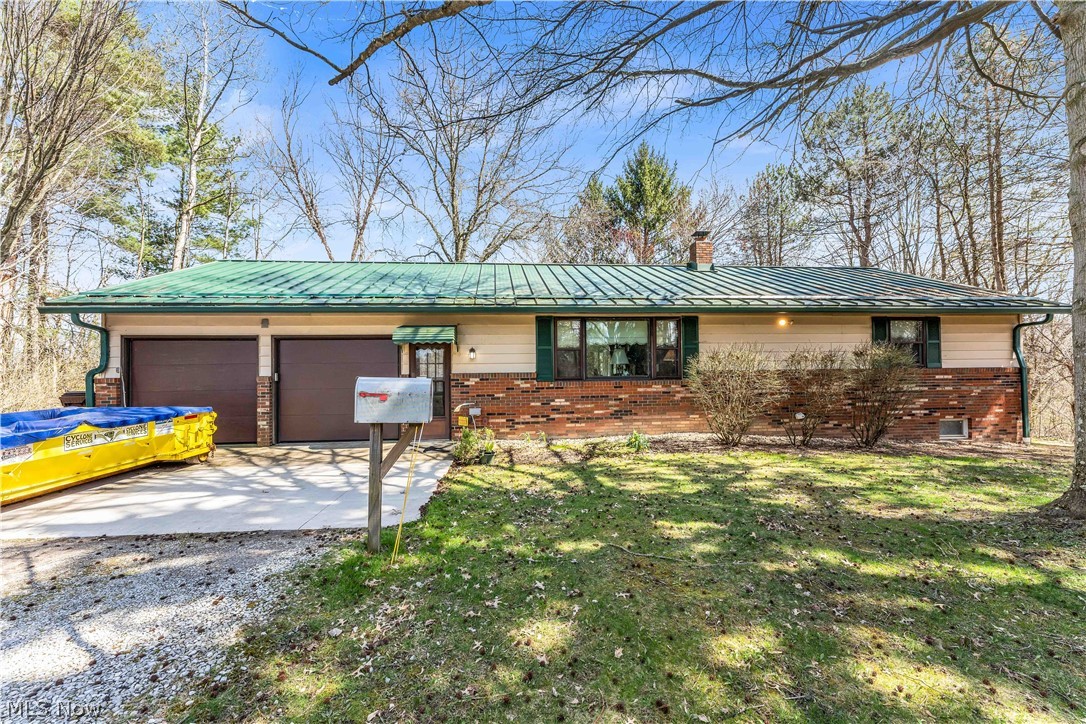 A hunters paradise, 25 plus acres of mature timber 2 ponds . All kinds of wildlife/ Well built ranch with full basement , Sunroom , large 20 x 32 pole barn. Generic back up electric supply .