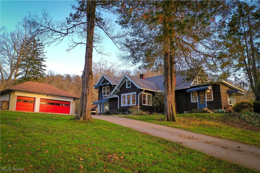 One of a kind property situated on 18+ acres overlooking the Muskingum River just minutes from downtown Marietta. Parcel includes 550 feet of river frontage across State Route 60 and MINERAL RIGHTS will convey! This cedar shingle cottage is bursting with farm house style and historical charm with original wood floors, french doors, Hoosier cabinets, exposed brick, antique sinks and a beautiful, light-filled summer kitchen. Since 2012 it has been lovingly renovated with major updates including a new roof, gutters and downspouts, all new plumbing, new wiring w/ 220 amp panel, new septic, new windows and much more!  Newly renovated kitchen with custom cabinets, stainless appliances, antique washboard sink and butcher block counter tops. Updated baths with marble flooring and custom vanities. The huge living room is full of windows w/ beautiful river views in every direction and the cozy wood burning fireplace insert heats up to 3,000 SF. First floor master suite with walk-in closet and sp