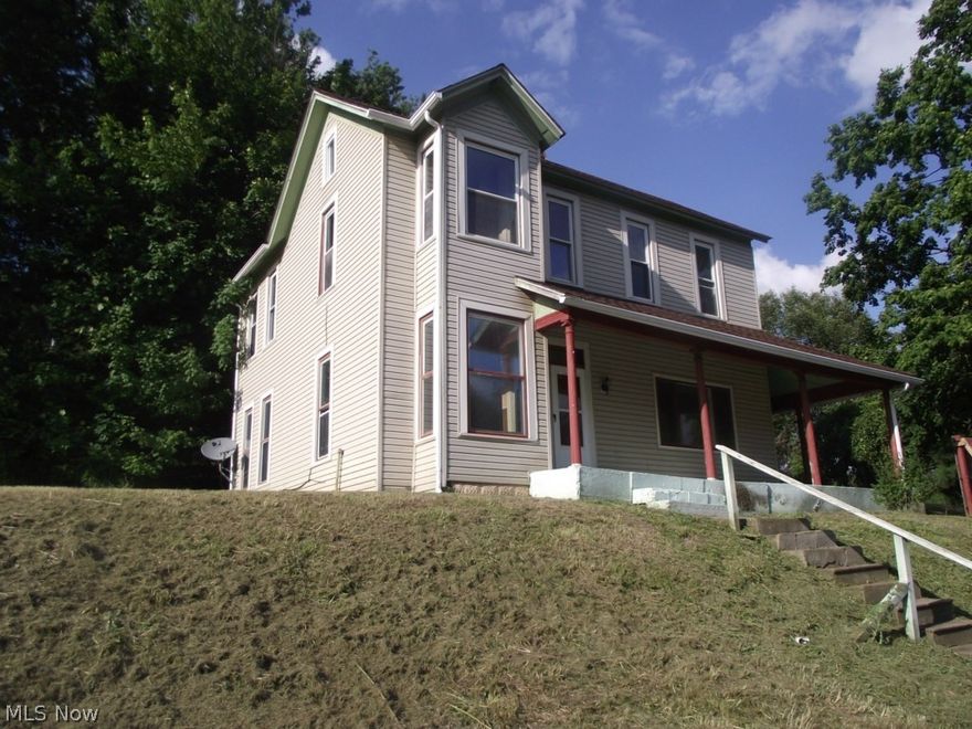 Good location on the outskirts of Cambridge. Vinyl siding, updated roof & 2 car garage.