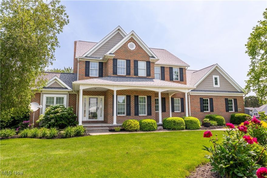 What an incredible home in North Canton Schools! This 4 BR, 4 BA home in the Greentree Allotment is filled with tons of custom updates! Every inch of this home has been updated & lovingly maintained. The expansive front porch welcomes you into this gorgeous home.  As you enter the home, you are welcomed in to great room that features hardwood floors, duel gas & wood burning fireplace with brick surround, as well as crown molding. The open concept kitchen that was newly remodeled, showcases an expansive island/breakfast bar, quartz counter tops, dinette, ceramic tile flooring, KraftMaid cabinetry & KitchenAid appliances. The dining room highlights crown molding, chair rail & tray ceiling, while the office features vaulted ceiling & built in book shelves. The office also makes a great first floor bedroom! Also situated on the 1st floor is the laundry room, full bathroom & access to the attached 3 car garage. Large upstairs master suite highlights vaulted ceiling, his & her walk-in closets, jetted soaker tub, private standup shower & plush carpet. Third full BA & 3 additional beautiful BR?s are also situated on the 2nd floor. The walkout lower level is perfect for entertaining with several finished rooms offering tons of room to roam. The basement has endless opportunities with a second laundry, second office, room to entertain and possible bedrooms.  If you are in the market for a grand home, this is the one! The basement walks out into your fully fenced in backyard with a deck overlooking the yard. Don't forget about the whole house audio system and reverse osmosis. Roof- 2020,HWT- 2021, HVAC 2021, new sump pump,
