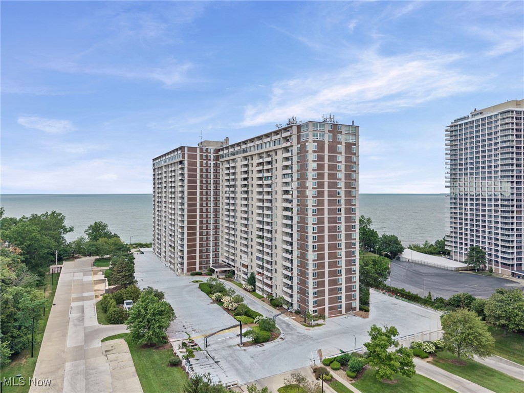Discover a perfect blend of convenience and comfort in this 2-bedroom, Lake Erie front condo ideally located just minutes from Downtown Cleveland and the scenic beauty of Edgewater Park. Set in the vibrant community of Lakewood, this home offers a lifestyle as dynamic as its surroundings. The interior boasts a bright, open layout that's both stylish and functional, where a wall of windows invite lots of natural light and city views. The 20' x 5' private balcony is the perfect place to enjoy the fresh air & sunsets without leaving your unit! Both bedrooms are spacious, the primary with a walk-in closet, and assigned storage can be found in the basement. Newer luxury vinyl flooring throughout most of the unit is attractive & easy to care for. The kitchen boasts manufactured quartz countertops & comes equipped with appliances. A heated garage space in the underground garage is included but there's ample parking available in the surface lot, too. What truly sets this property apart is the building itself. Designed to feel like a small resort, it offers a plethora of services & amenities: fitness center, indoor & outdoor pools, party & game rooms, racquetball/pickleball court, convenience store, beauty shop and more all tailored to make daily life feel like a getaway. Enjoy dining at the popular Summer Place restaurant without leaving the building! The Carlyle also boasts 24 hr. staff including security! Whether you're unwinding after work or gathering with neighbors, this building supports a lifestyle of convenience, connection, and leisure for all ages!