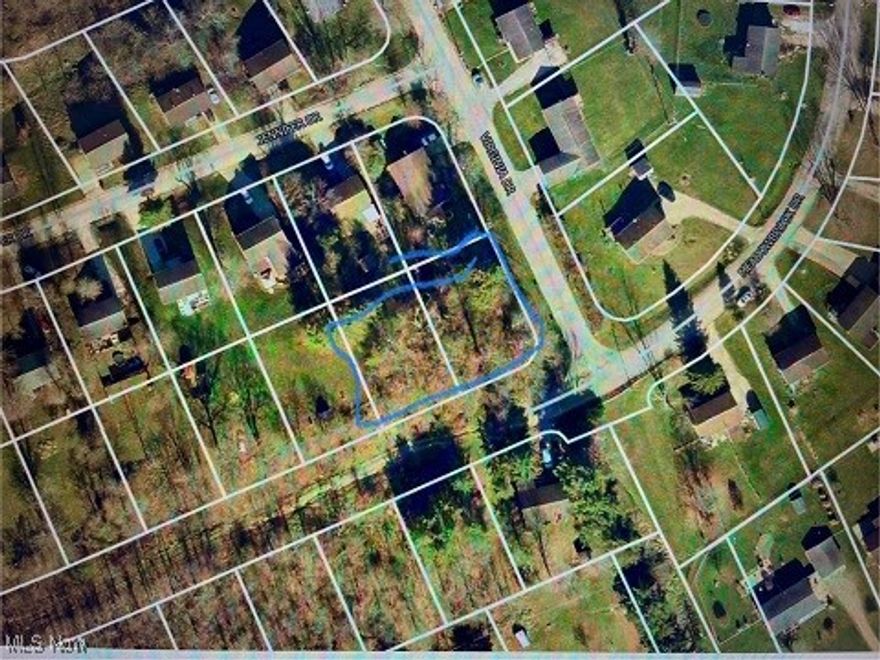 Build your dream home on this corner lot behind the Rolling Hills schools. This lot is almost a half an acre and is located 3 miles to interstate 77. Utilities are available! If you've been thinking of building, come check this one out.