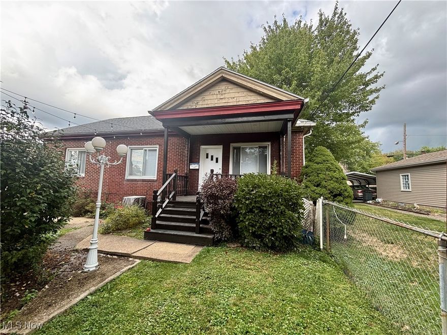 CONSIDER THE POSSIBILITIES! TWO SPACES, ONE LOW PRICE! What's your vision for this unique property? This former church, built in 1910, has been transformed into a recording studio, but could become an office, retail space, event venue or a creative workspace. The main level offers a large open space with a loft, while the basement has a kitchenette, offices, and restrooms. A parking lot provides convenient access for visitors and staff. Included in the sale is a charming brick home with numerous updates, such as newer windows, appliances, flooring, recessed lighting, HVAC system, tankless water heater, and fresh paint. The house features a living room with a gas fireplace, dining room, eat-in kitchen, two bedrooms, a full bath and a hidden door to the finished attic. The basement provides laundry and storage space, plus glass block windows and a walk-out with direct access to the yard.