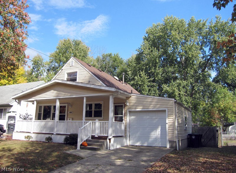 Without a doubt one of the most attractive and charming homes on the street! Cozy front porch, Kitchen is open to living room and dining area. Huge & private completely fenced yard that's pet ready! Street is adjacent to Summit Metro Park hike and bike trail. Newly finished recreation room in 2014 and glass block windows in the basement that has a walk out door to backyard. Attached garage with opener. All outlets and light switches replaced along with ceiling fans. Recessed canned lighting in kitchen added. All carpet in flooring on the first floor recently replaced. New hot water tank in 2016 entire first floor recently repainted includes a newer shed and picnic table and all appliances stay, a one year warranty is included. Hurry on this beauty!!