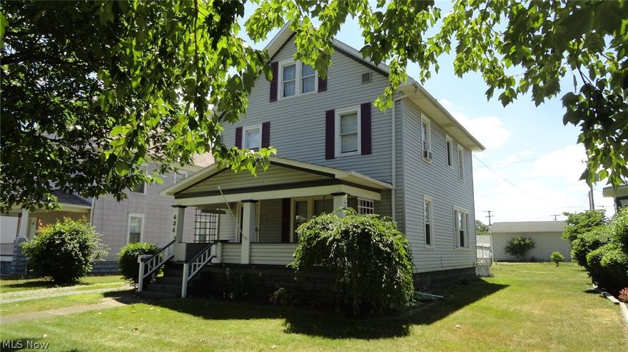 Spacious 4 bedroom vinyl sided home.  Original woodwork in the living room.  Oak kitchen with breakfast bar.  Hardwood floors in the formal dining room with original woodwork.  4 bedrooms on the second floor-2 with hardwood floors.  Finished walk up attic.  Some replacement windows.  Insulated 1 car detached garage with electric.  Level lot with a 10 X 8 storage shed.  Rear alley access with parking area for 3 cars.  Exclude the porch swing and dehumidifier.  Move in condition.  Immediate possession.