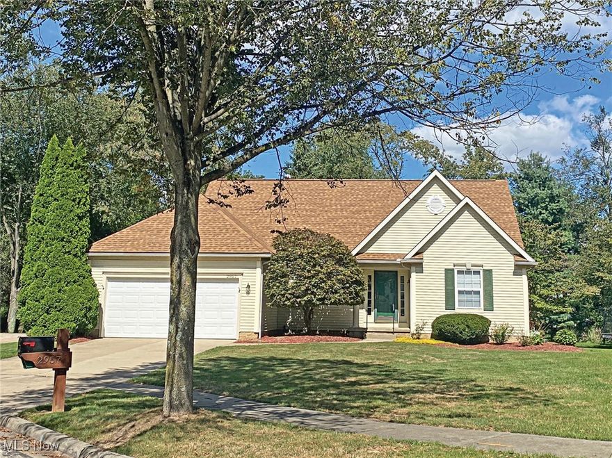 Perfect for those seeking the ease of one-floor living, this Villages of Fairlawn 3-bedroom, 3.5-bath cape-cod offers over 2,200 sq. ft. of thoughtfully designed space that blends comfort, convenience, and timeless style. The main level is enhanced by hardwood and hard-surface flooring throughout. A welcoming foyer opens to a vaulted living room with a fireplace and a formal dining room, creating an elegant setting for both everyday living and entertaining. The kitchen, with its casual dining area, flows seamlessly into a four-season sunroom filled with natural light and opening to a spacious deck—ideal for outdoor dining or simply enjoying the setting.  The first-floor primary suite, complete with two walk-in closets and a spacious bath, makes main-level living effortless, while a first floor laundry and attached two-car garage add everyday practicality.  Upstairs are two bedrooms sharing a hall bath.  A partially finished lower level expands the home’s versatility with a full bath, abundant storage, and plenty of room for hobbies, guests, or recreation. The layout ensures that while one-floor living is fully achievable, there’s no shortage of flexible space when needed ... and storage galore!  Situated in a desirable community close to shopping, dining, parks, and major highways, this home offers a lifestyle of convenience and ease. Newer Roof and HVAC!  With its combination of main-level living, adaptable spaces, and refined design, it presents a rare opportunity to simplify without sacrifice.  All in a convenient Villages of Fairlawn location minutes from shopping, dining, highways, parks and more!