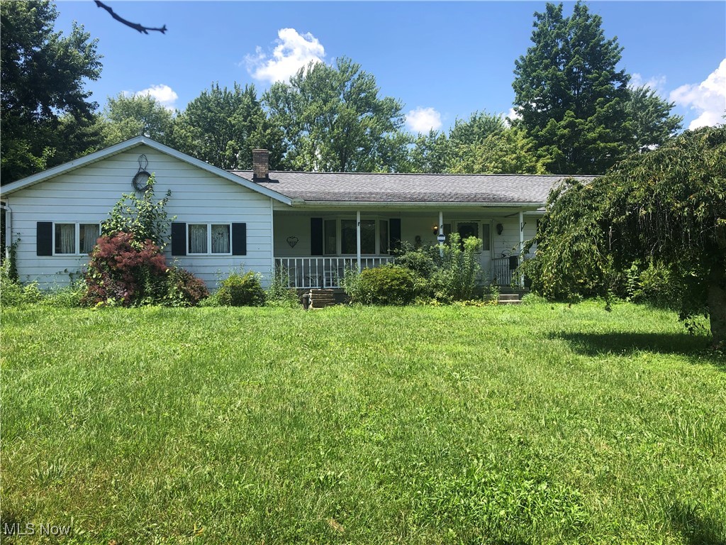 This Ranch has a lot of potential. Needs some TLC and clean up. Corner lot with over 2 acres and a built in pool.