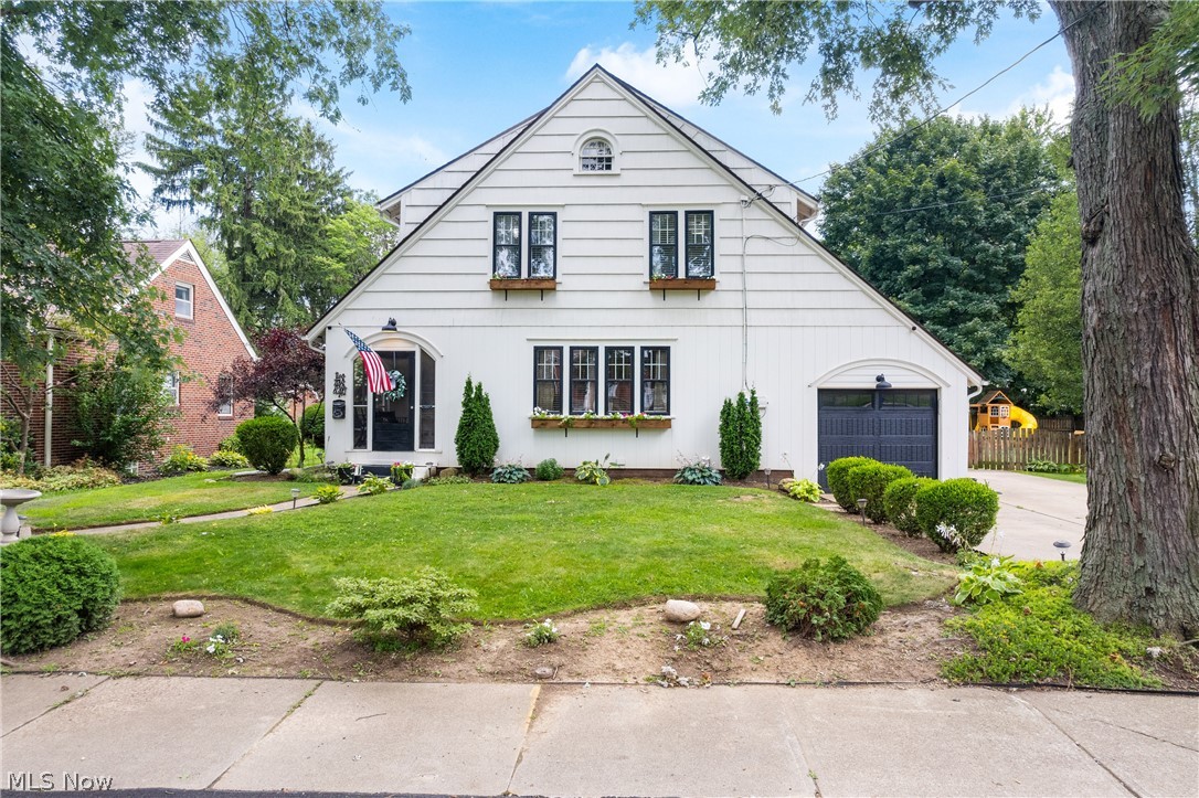 Welcome to 2008 Washington Blvd! This 4 bedroom, 2 bathroom home on a double lot is sure to impress! Located in Canton on a tree lined boulevard, in a quiet neighborhood, perfect for morning walks to Starbucks or Dunkin Donuts. Upon entering you are welcomed by a cozy screened in porch that leads you into a spacious living room that is flooded with natural light and has hardwood floors. The kitchen has beautiful white cabinetry, updated fixtures, and a glass slider that leads to the back deck. Upstairs there is a large primary bedroom, three additional bedrooms (be sure to check out the third floor!), and an updated full bathroom. The finished basement adds even more living space with a large flex space, a wet bar, a full bathroom, and a laundry area! The backyard is the perfect spot for entertaining or relaxing with a large deck and pool! Some recent updates include - new AC (2024), freshly painted deck painted (2023), upstairs bathroom remodel (2021), and new gutters and garage door (2020). Schedule your showing today!