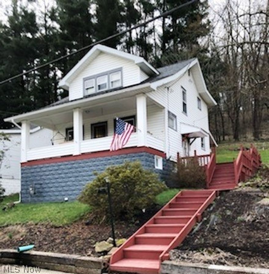 Adorable home on 1/2 Acre lot with parklike setting. 2 Car garage, lovely front porch and large rear deck. Spacious country kitchen and family room. Gas heat, updated central air and flooring.