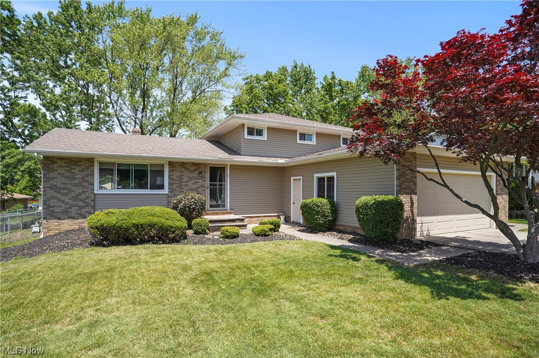 Pristine beauty! Welcome home to this gorgeous four-bedroom, two full bath spacious split level. Come on in through the new storm door (2023) to the large open living room that has a ceiling oak beam, large window to let the natural light shine in, electric blinds through-out (2020), and oak wood floors, railings and stairs, as well as oak doors through the home. New windows (2016). The stunning bright kitchen has been updated with Quartz countertops, garden sink, new faucets, tile backsplash, new soft close cabinets with under mounting lighting. Newer stainless-steel LG Fridge, dishwasher (2022), stainless steel microwave and newer stove. Kitchen is open to the family room which has a slider door to the full screened in Florida room where you can sit out and enjoy your morning cup of coffee etc. To finish the main level there is a bedroom or could be used as an office and a totally redone full bathroom with tile shower, new tile floor and new high-rise toilet. WOW! Upstairs you will f