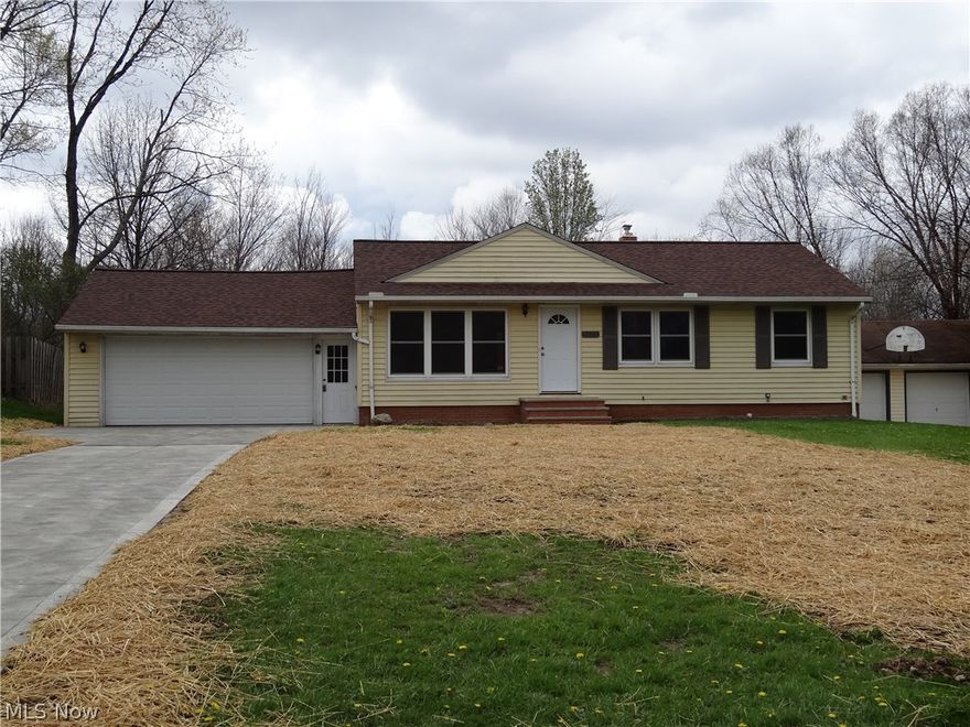 This cozy low maintenance ranch with attached 2 car garage has a rear garage door on the backside of the garage for easy access to the extra-large all fenced in back yard. It's a great place for that family picnic or a great play ground for your children and their friends! The home comes with a new roof, new driveway and large deck. The kitchen is brand new with stainless appliance. Both bathrooms are brand new and the formal living comes with hardwood floors and plastered cove ceilings. All three bedrooms have brand new carpeting. This on is a must see.