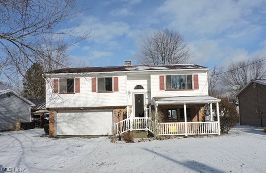 Boardman Township/ Youngstown School Bi level designed home. Front covered patio along with rear open patio. Traditional bi level design with lower level family room plus half bath and utility/ laundry room with access to attached garage. Upper level open living dining area and three bedroom plus full bath. “ Seller will not complete any repairs to the subject property, either lender or buyer requested. The property is sold in AS IS condition”