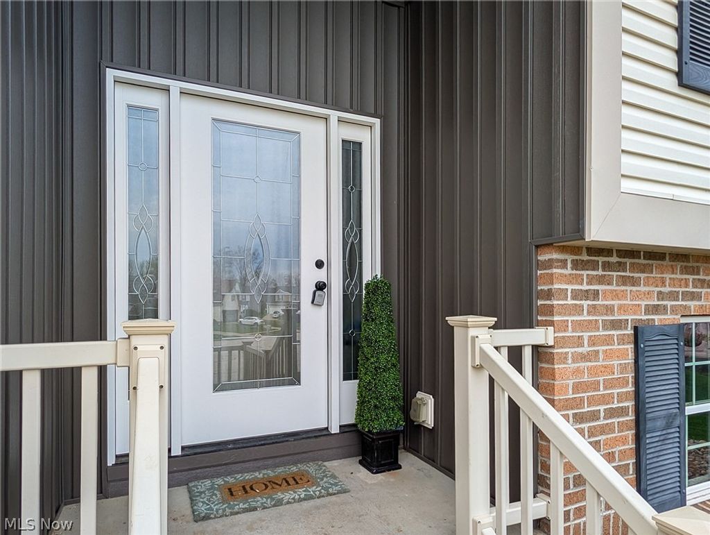 Photo of 1154 Eaton Drive, Akron, OH 44312 (MLS # 5200715)