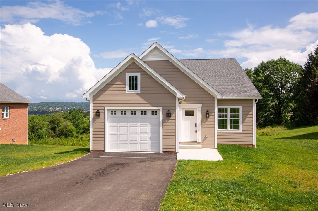Enjoy your brand-new home in Coshocton. Enter the high-ceiling living room and open concept kitchen with stainless steel appliances. Relax in the dining room with stunning valley views and access to the back deck. The primary suite and second bedrooms and two full bathrooms are on the main level. From the attached garage, enter the mudroom/laundry room with deep green built in cabinets. In the full walk out basement find the third bedroom, and third bathroom, bonus room, and more space for storage or more finishing potential. Less than a mile from historic Roscoe Village. Taxes are estimated based on rates listed on the Coshocton County Auditor's website.