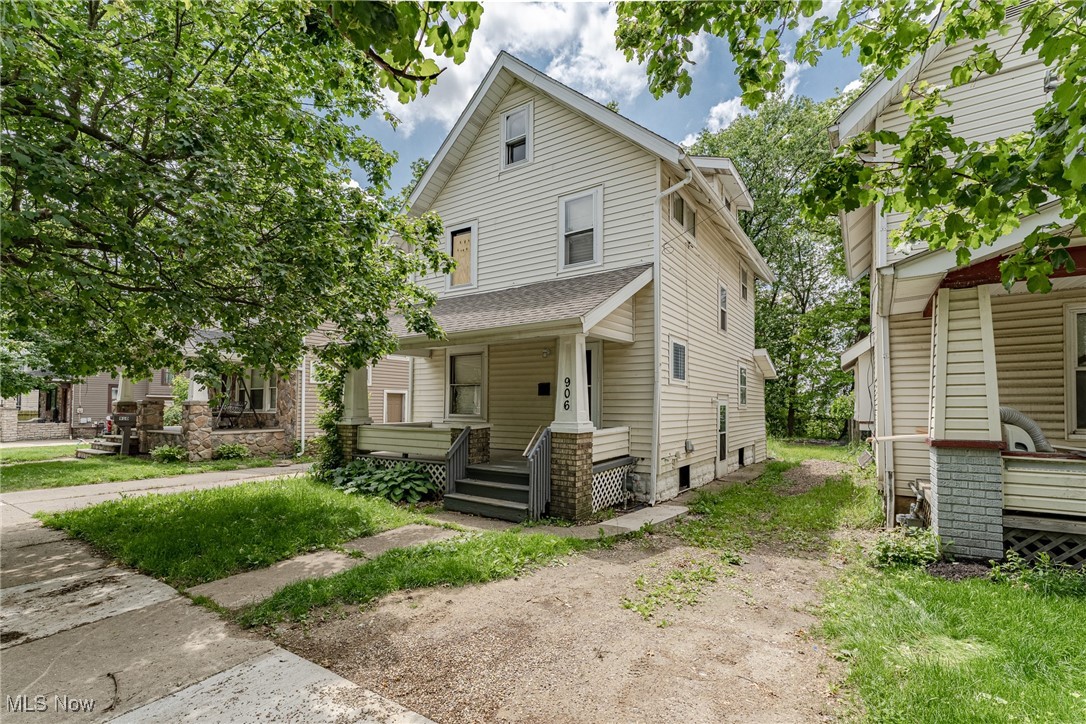 Welcome to 906 Beardsley St – A Charming Colonial Full of Character in Akron! This well-kept home has been recently renovated and is ready for your finishing touches. A welcoming front porch invites you inside, where you'll find LVP flooring throughout and abundant natural light streaming through the living room window. Original woodwork and built-ins in the living and dining rooms add timeless charm and warmth. The kitchen includes a refrigerator, dishwasher, and stove, along with granite countertops, updated cabinets, and a cozy eat-in area—perfect for casual meals. Upstairs, you'll find three generously sized bedrooms with newer flooring, plus a beautifully renovated full bath. The finished third-floor bonus room offers flexible space and could easily serve as a fourth bedroom, office, or hobby area. The basement includes a dryer and washer hookups, offering practical storage and laundry space. Outside, the spacious yard is a blank canvas—ready for you to create your dream garden, outdoor entertaining space, or peaceful retreat. For added value and peace of mind, the home is lead certified, AMHA approved, and features several new windows set to be installed in the coming weeks. A new tenant is scheduled to move in on 7/1, making this an excellent option for investors or those looking for immediate occupancy potential. Don’t miss the opportunity to bring your vision to life in this charming Akron home!