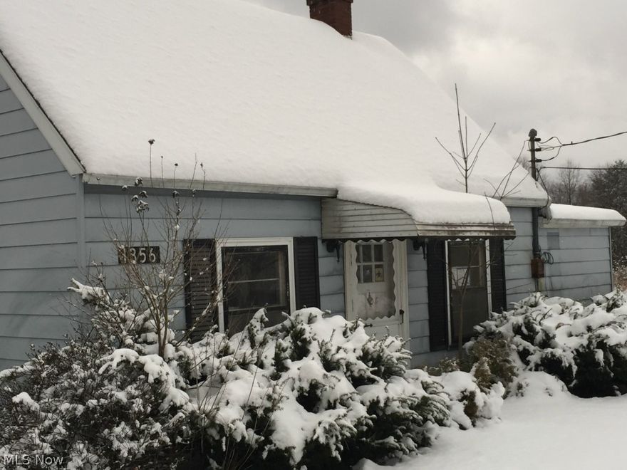 Country living close to the lake.  2-Car garage.  Needs some TLC.  Almost an acre of land.