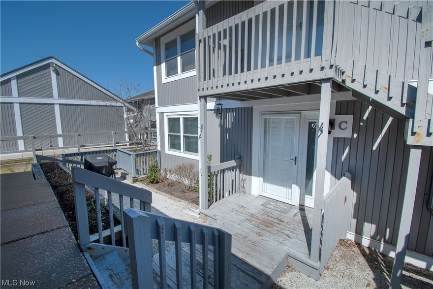 Welcome to this beautifully updated condo located in Snug Harbor. You will love the bright, airy open floor plan with abundant natural light as you enter this well-maintained and spacious condo. This two-bedroom, two-full-bath condo offers beautiful views of the lake throughout. The modern kitchen provides cabinets galore, stainless steel appliances, and a breakfast bar. The spacious great room features a wood-burning fireplace with a beautiful mantel, an abundance of natural light, and access to the porch. The enclosed porch (15x7) is perfect for relaxing and taking in the view of the lake. The master bedroom has a walk-in closet (8x6) and a private bath with a large tile walk-in shower. The second bedroom, another full bath with a large vanity, a laundry room with extra storage, and a detached 1-car garage finish the house. The association has a basketball court, a covered pavilion, and a dock to launch a kayak or canoe to tour Long Lake. While this beautiful condo is tucked away, yo