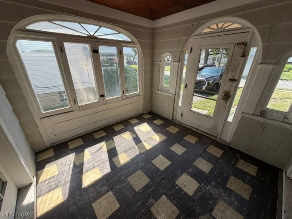 Photo of 10607 S Highland Avenue, Garfield Heights, OH 44125 (MLS # 5224640)