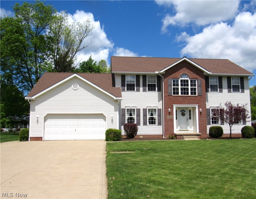 Great 4 bedroom colonial on culdesac rd. 2 story foyer , Living room with laminate floor , formal dining and large oak eat in kitchen with bar area and family room open from the kitchen. First floor den and first floor laundry! Sliders in eating area leads to large deck. Master bedroom with walk in closet and master bath with garden tub and separate shower. Other 3 bedrooms with generous closet space! Finished lower level with 2 rec rooms ,one with built in bar area - also another full bath in the lower level too.Call to see this home today!!