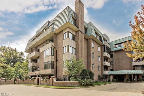 Photo of 5150 Three Village Drive #1-K, Lyndhurst, OH 44124 (MLS # 5237470)