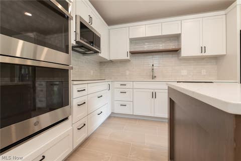 Tiny photo for 5150 Three Village Drive #1-K, Lyndhurst, OH 44124 (MLS # 5237470)