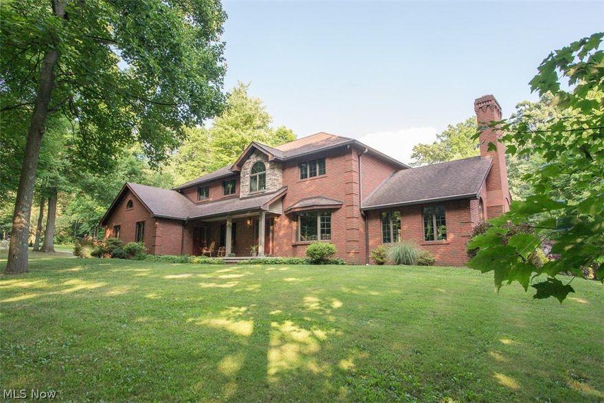 This stunning all brick custom colonial home boosts 4 spacious bedrooms, including a master suite with a walk in closet and private master bath with separate shower and jetted tub. An additional bathroom, 3 bedrooms, and laundry room complete the second floor. The updated open concept kitchen has hardwood floors, stainless steel appliances, granite countertops, and a large center island perfect for family gatherings. The main floor has a large family room with a stone fireplace, 1 full bath, formal living room space, and a multipurpose room all with an abundance of natural light. The yard features over five acres of beautifully landscaped property highlighted by a large fenced in pool that creates a summer time retreat that is great for entertaining. A nature stone patio and a composite deck compliment the pool area for additional entertainment space. The attached 3 car garage offers plenty of storage with access to the covered front porch. The large walkout basement has a fully functional second masonry fireplace and offers endless possibilities for additional living space. There is ample storage throughout the entire home. Extras include spray foam insulation for added energy efficiency, new furnace and air-conditioner (2018), solid wood doors throughout, crown molding, chair rail, security cameras, and all appliances.