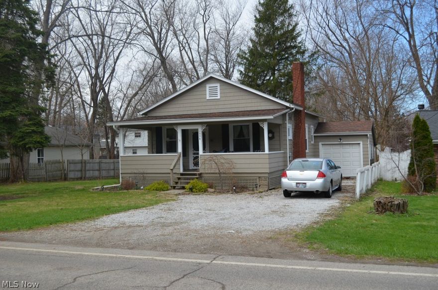 No detail has been missed in this totally updated home. The front porch is welcoming. The perfect spot to sit and watch the world go by. The Living room has new carpet and a cozy fireplace. The kitchen is gorgeous with newer cabinets, granite counter tops, stainless appliances, lighting, and flooring. The bath has been totally updated including beautiful tile surround. There is new carpet throughout and the whole house has been freshly painted. The roof, windows, and HW tank are also newer and the electrical and plumbing were updated. Home also has leaf guard on gutters and blown in insulation in attic. The home even has a newer deck and has been beautifully landscaped. There really is nothing to do but move in!  The home also has a pellet stove for the those cold winter night. Very cost effective!! call agent today for your private showing!!