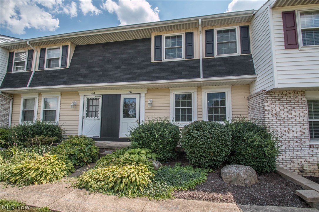 Turn-Key Ready, you'll find new paint and flooring in this 3 Bed 1.5 bath townhouse style colonial condo with updated baths & lower level family room. The main floor boasts a cheerful living room, kitchen/dining area with new laminate, pantry, and half bath. The second floor has 3 bedrooms (MABR w/ new carpeting) with large closets, full bath. New entry doors in 2005 and most major mechanicals 10 YEARS OLD OR LESS. New dishwasher being installed 8/3/17. Windows are 7 years old, FURNACE 8. Drive through to get a sense of the serene & green setting. Wonderful living community with sidewalks, fishing POND, kids swings, tennis courts and an in-ground POOL all for your use! Great LOCATION in North Stow just off Route 91 & just 3 miles South of Hudson. Just minutes from shopping, restaurants, grocery stores, bikeNhike trail and easy access to Routes 8 & 59, making it convenient also to Kent/KSU, Akron/Akron U, Cleveland. The lower level has 200 additional finished sq. ft that can be used a