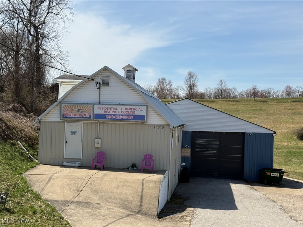 Prime commercial location - outside of city limits. Over 6,500 sq ft total under roof with 3 offices, conference room, kitchen and over 5,300 sq ft of warehouse/garage space, 14 x 25 - 3 sided storage shed. Property also has 4 billboards that are leasable. This property is all set up and ready to go.