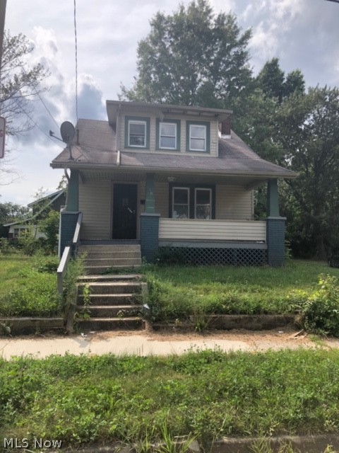HANDYMAN SPECIAL! This 2 bedroom, 1 bath, full basement, 1.5 Story Bungalow with 876 sq/ft is a great project. A little effort and it can be rented and cash flowing in NO TIME. A great portfolio builder! TREMENDOUS UPSIDE!! All reasonable offers will be reviewed. Property being sold AS- IS! Schedule your private showing NOW!