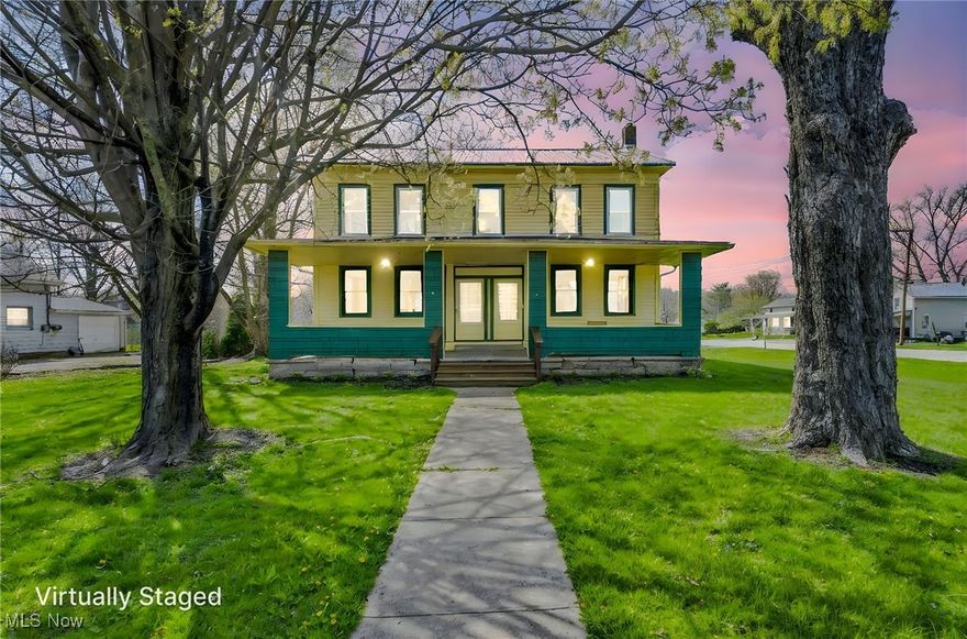 Investors Dream!  Welcome to this home8935 S. Main St.  This used to be a twinplex but the prior owner removed the dividing wall.  Wall can be put back up and made back into an investment property.  Each side has 2 bedrooms with 1 updated bathroom, kitchen and family room.  Each side is roughly 1200 sq feet.  There is a 2 car garage in the back of the residence.  There are 2 furnaces, 2 hot water tanks, 2 electrical panels.  The gas can be easily converted to 2 and same with the water meter.  Each unit has a back door as well.  Call for a private showing today!  Dividing wall will need to be put back up.  Seller is working on getting quotes