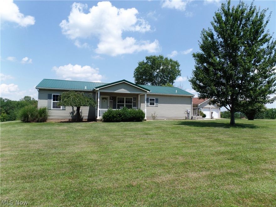 Open and airy ranch overlooking 4.5+ acres and a pond! If you long to live in the country on a nice paved road yet not far from town, then this home is calling your name! There is plenty of room outside and in. The 3+ car garage has garage door openers, electric and heat. Inside there could be up to 5 bedrooms.Full, unfinished basement is a great space for storage, a hobby area or can be finished for additional living space. New carpet and so much more. Furnace is geothermal which keeps the utilities low. Check out the nice appliances which are included in the sale, A must see!