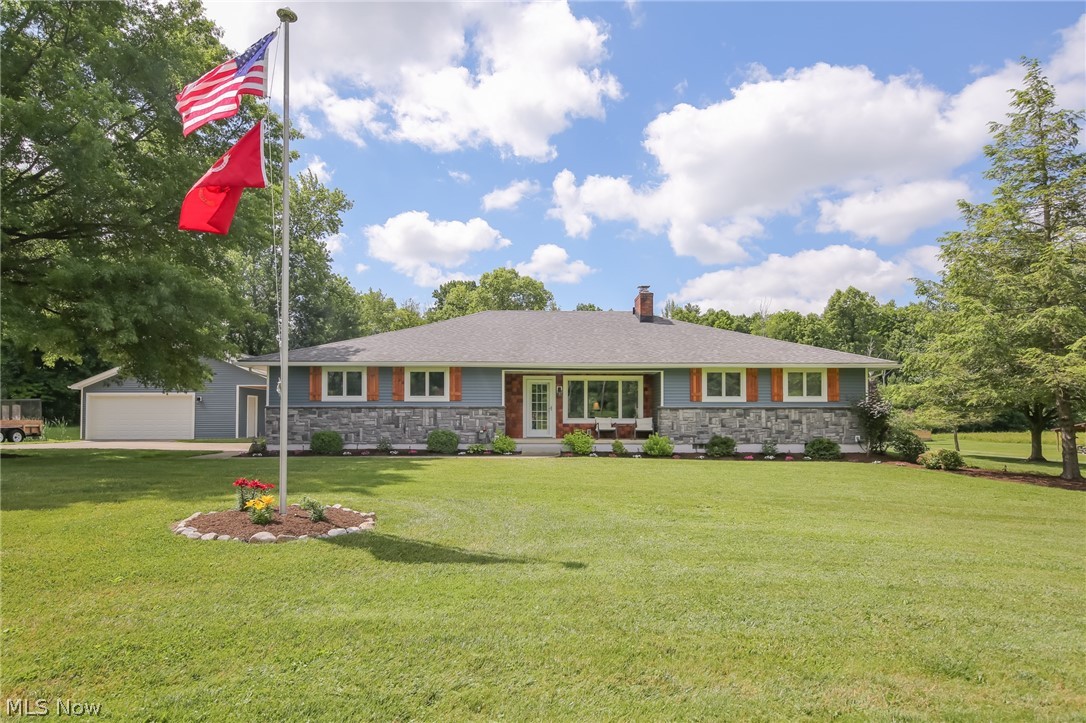 Amazing ranch homestead on 5+ acres! Every detail has been meticulously maintained and updated. Incredible outdoor living space complete with a 1/2 acre stocked pond, an above-ground pool, and a shooting range. The large kitchen was completely remodeled and boasts sleek leathered granite countertops and lots of space for food prep and entertaining. Kitchen appliances offered. New doors throughout. New windows and AC ensure high-efficiency heating and cooling. The basement was waterproofed prior to current owners. Everything about this house is spectacular.