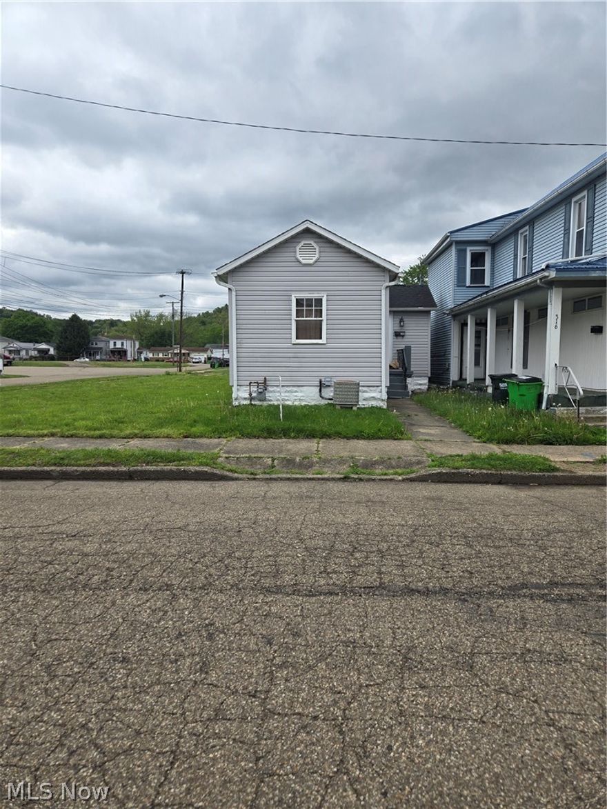 Very well maintained cozy ranch.  If you are looking to downsize or need an investment property.  Main floor living with bedroom, living room, kitchen and bathroom.  Kitchen leads to backdoor entryway with an area for coats and shoes.  Basement has washer and dryer hook-up and lots of space for storage.  Electric average $90/Gas average $50/Water average $60.  HWT is rented.  Appliances included are refrigerator and stove.