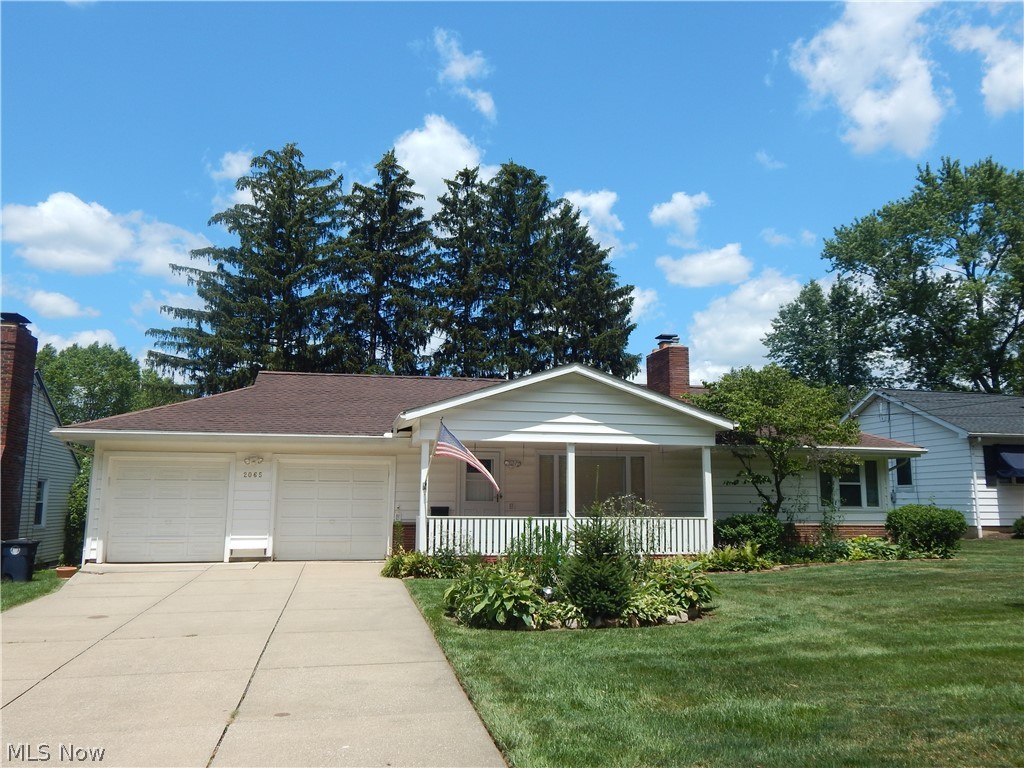 Spacious first floor living. Featuring beautiful hardwood floors in living room, dining room and bedrooms. Living room has large picture window for natural sun light. Fireplace, open to formal dinging area. The covered front porch is sure to please, the rear cooking deck and oversize patio is great for entertaining. Fenced rear yard with storage shed. This home features step down family room addition, kitchen with dinette or optional use for owners choice. Full size basement, updated mechanicals. Two car attached garage.