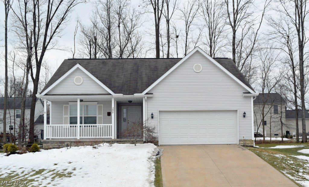 Check out this move-in-ready Ranch! Freshly painted with all neutral colors. Open floor plan built in 2006 with vaulted ceilings in great room, kitchen and dining room. Great room features a ventless gas fireplace and opens to the dining room/kitchen. Master suite includes large master bathroom with dual sinks and walk-in closet. 2nd and 3rd bedrooms are also on the 1st floor with the other full bathroom between them. 1st floor laundry. Basement is huge and includes a finished room great for a playroom or rec. room. High-efficeint gas furnace and high-efficient water hear to keep utility bills low. Backyard is ready for summer with a spacious 12'x14' deck. Ranch homes are in high demand so don't wait until this is sold! Call today to schedule your own personal showing!