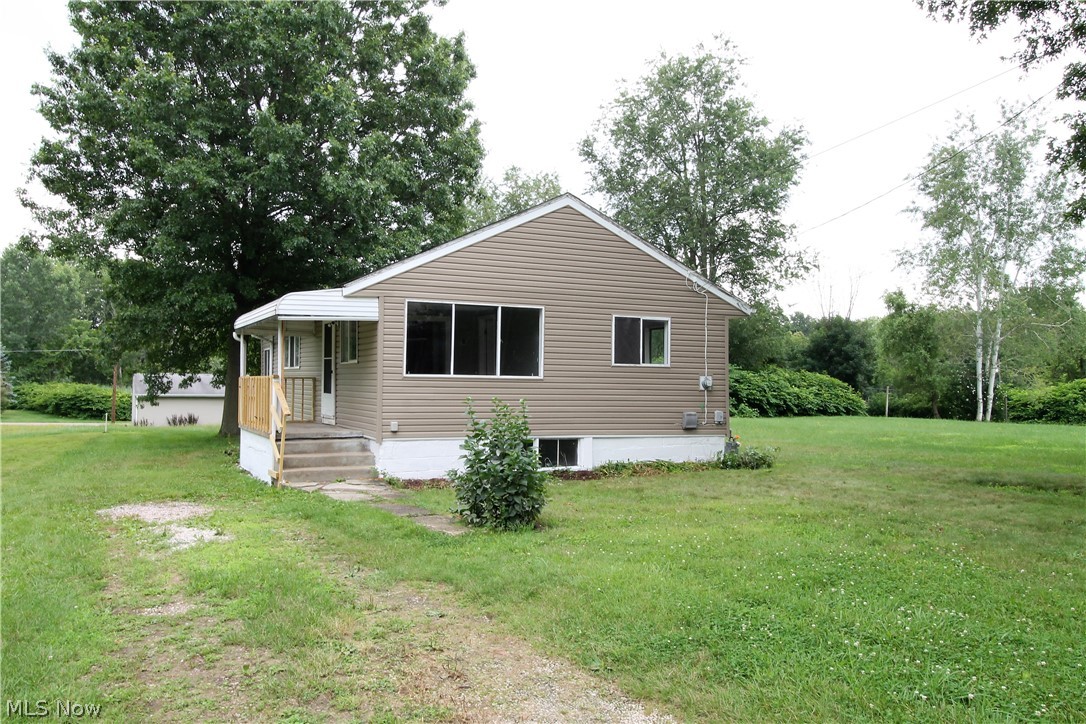 Great opportunity for investors! Or charming starter home! Be your own decorator with this two bedroom, one full bath ranch home. Some updates in (2021) include siding, carpet and freshly painted in back room, new kitchen faucet, new lock set, glass bock windows, new handrail. WOW! This home offers a covered porch, living room, two large bedrooms and full bath. The kitchen has an eat in area, large windows to let the natural light to shine through. Large yard for entertaining or just relaxing. Endless of possibilities! Precious memories begin right here!