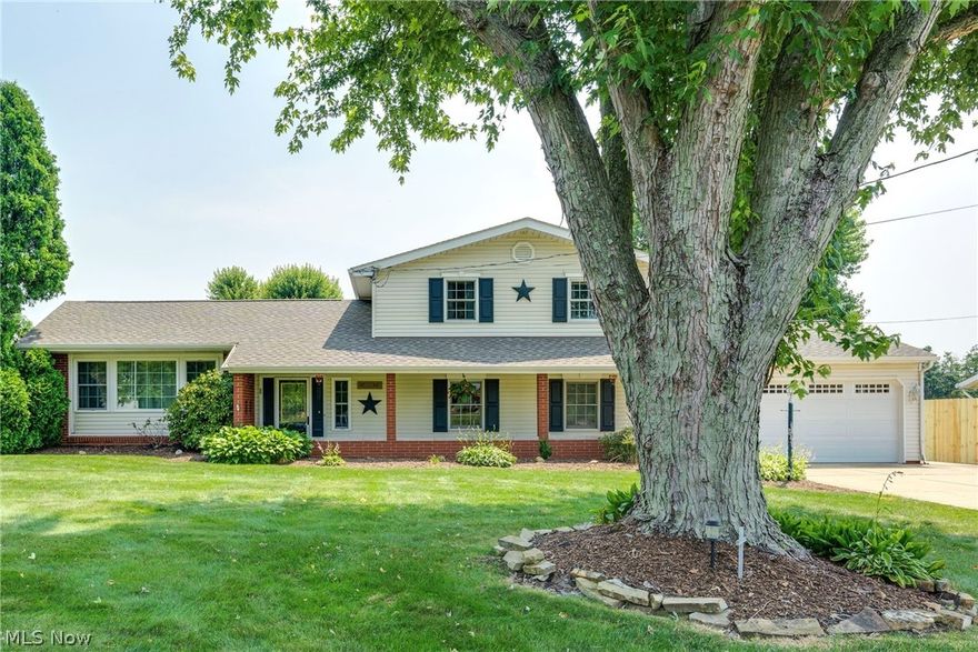 Just listed this beautiful 4 bedroom split level with spacious living areas and entertaining space inside and out! Features over 2,100+ sq. ft. with a lovely kitchen with newer stainless appliances and corian countertops.  4 bedrooms and 2 full baths, and spacious sun room/Ohio State Room, opening onto a gorgeous outdoor patio area with a new $10k+ aluminum pool, Outdoor bar area with grill and refrigerator built into the solid stone cooking area.  Beyond the patio is a heated 26x40 pole garage in back with a concrete floor ready for your man-cave or auto mechanic shop! Home also features a new roof, new reverse osmosis system, and many more updates.  Come take a look before it is gone! 
(Please note the small children's log cabin in backyard was a gift from a family member and does not stay)
